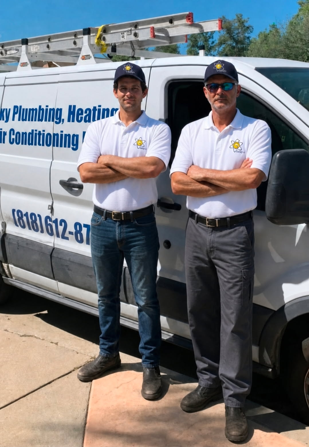 Two men in matching uniforms stand with arms crossed in front of a work van labeled for plumbing, heating, and air conditioning services.